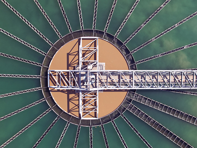 Could you talk about how service network complexity affects water and wastewater utilities?