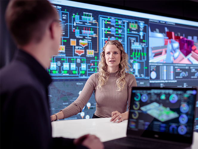 Engineer reviewing real-time operational data in an AVEVA Unified Operations Center.